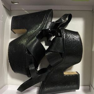 Used black Michael Kors  wedges size 6